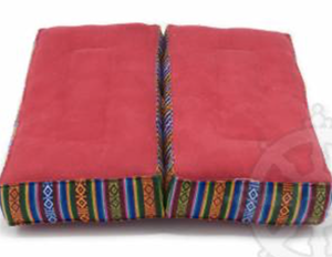 The rectangular shape, often referred to as the square or rectangular meditation cushion, provides amazing comfort.  It is a model widely used in Tibetan Buddhist centers and temples.  There is also a variation, originating from Nepal, which, when folded in the centre, doubles the height of the cushion and makes it easy to transport. These two types of meditation cushions are fairly or even very firm.